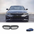 Load image into Gallery viewer, Front view of a black BMW 3 Series G20 showcasing the installed ENKAHNZ centre grille, with a close-up product image of the grille displayed at the bottom.