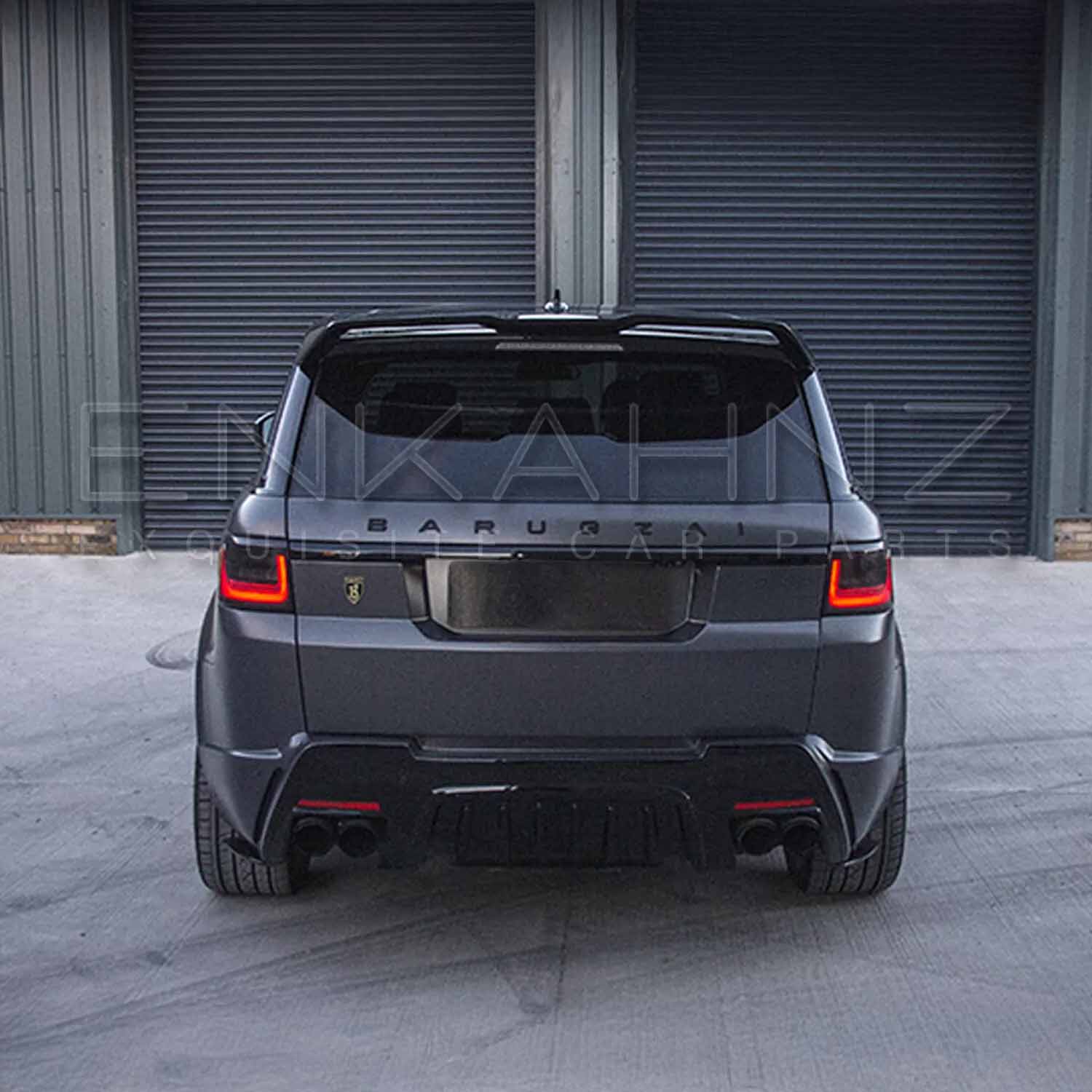 Rear angle of matte grey Range Rover Sport with Cabaro kit showing diffuser, bumper and exhaust surrounds.