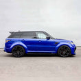 Load image into Gallery viewer, Side view of a Range Rover SVR featuring the Barugzai Cabaro bodykit, highlighting the wide arches and dynamic profile.