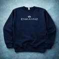 Load image into Gallery viewer, Navy blue sweatshirt with 'ENKAHNZ' logo on a textured gray background