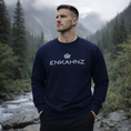 Load image into Gallery viewer, Man wearing a navy blue sweatshirt with 'ENKAHNZ' logo in a forest setting