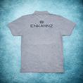 Load image into Gallery viewer, Enkahnz Trademark Polo T-Shirt – Grey Teal background Rear Version in a premium teal background.