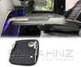 Load image into Gallery viewer, Side view of the Rear Seat in a G-Wagon W464-W465 with the item in the bottom.