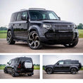 Load image into Gallery viewer, Black Land Rover Defender SUV shown from multiple angles on a road with grassy fields in the background. Fitted with Barugzai Sabre 22" in Gloss Black Polished Face