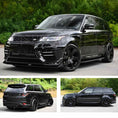 Load image into Gallery viewer, Black Range Rover Sport L494 2018-2022, fitted with Barugzai Sport Aero II bodykit, parked on a road with a hedge in the background. Fitted with Barugzai Sabre 22" alloy wheels in Gloss Black