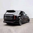 Load image into Gallery viewer, Black Range Rover L460 2022, fitted with Barugzai Nebula bodykit, shown rear quarter angle, parked on a road with a grey background. Fitted with Barugzai Vortex Forged 24" alloy wheels in Gloss Black Polished