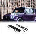 Load image into Gallery viewer, Front quarter view close up of a Purple Mercedes-Benz G-Class fitted with a Roof LED Light Bar in Gloss Black on a white background