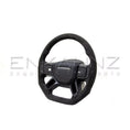Load image into Gallery viewer, Alcantara heated steering wheel on a white background for Defender.
