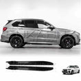 Load image into Gallery viewer, Silver BMW with ENKAHNZ Bodykit fitted with F15 bodykit facing side ways with the side skirts visible at the bottom.
