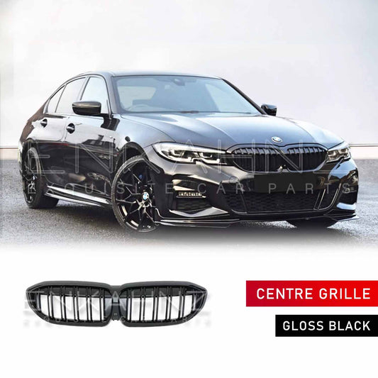 Front Quarter angle shot of a black BMW 3 Series G20 parked on a concrete road with a white backdrop, fitted with an ENKAHNZ centre grille; product grille shown at the bottom of the image.