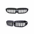 Load image into Gallery viewer, Isolated product image showing the ENKAHNZ centre grille for BMW 3 Series G20 from two different angles, highlighting its premium build and unique styling.
