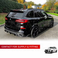 Load image into Gallery viewer, Rear quarter angle of BMW X5 G05 fitted with Enkahnz carbon fibre bodykit, showcasing rear spoiler, diffuser, and bold wheel arches for a performance-driven look.
