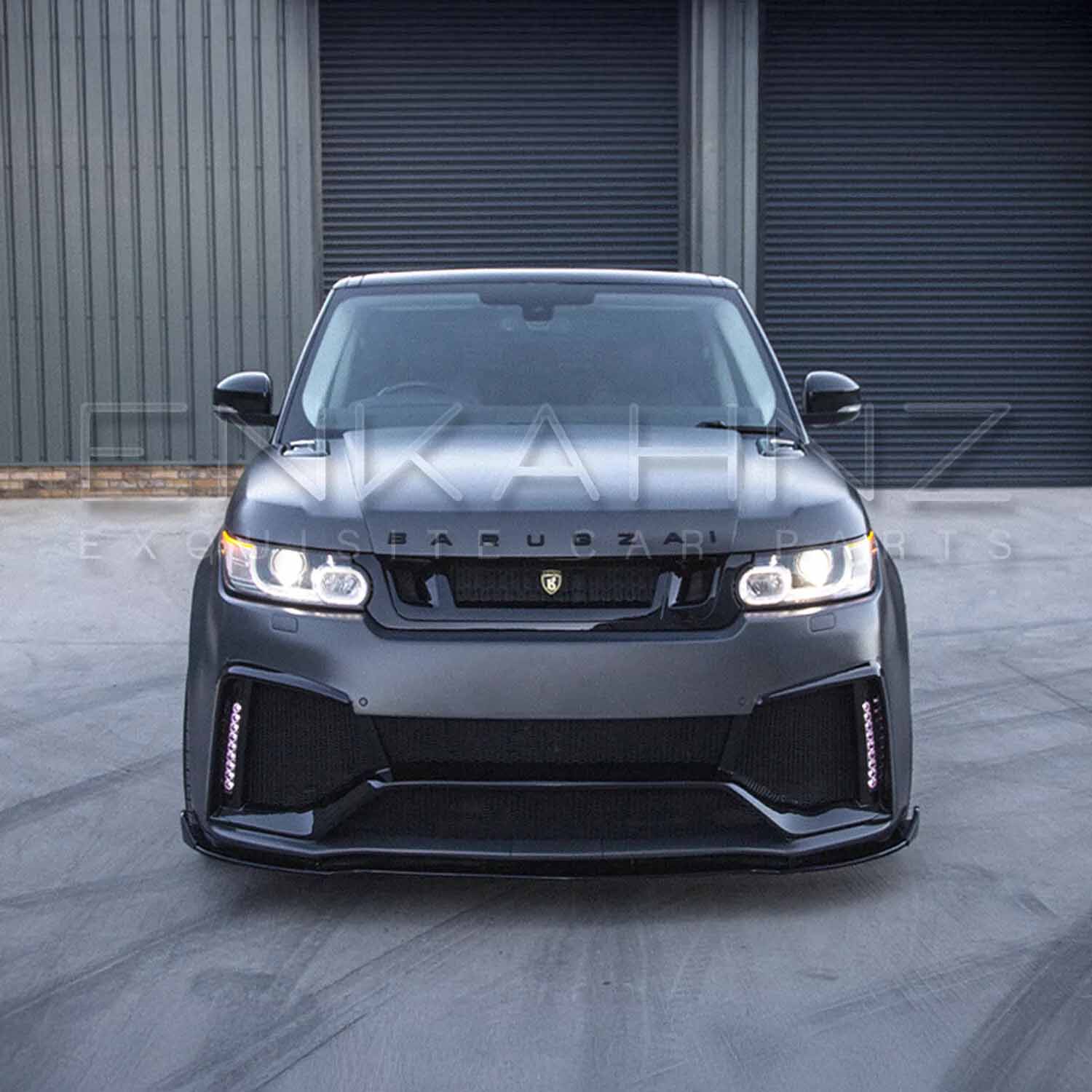 Barugzai Cabaro on matte grey Range Rover Sport, clean front angle highlighting bumper and grille details.