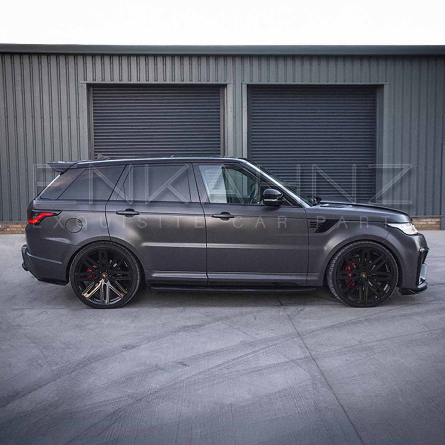 Side angle of Range Rover Sport Cabaro kit, emphasizing widened arches and side skirts in matte grey.
