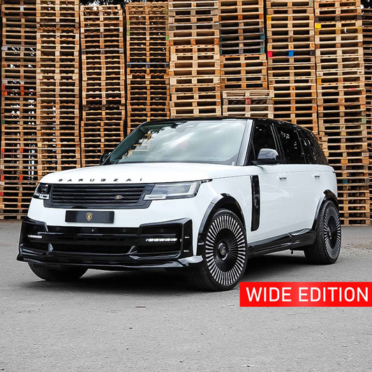 ange Rover Vogue L460 2022+ in white and black with Barugzai Nebula bodykit and Vortex wheels, front quarter angle with stacked wooden crates in the background.