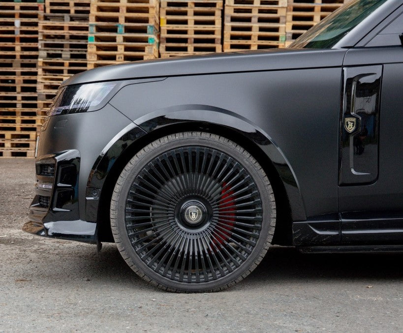 Side angle close‑up of front section showing Barugzai Nebula side panels and Vortex wheel design on the Range Rover Vogue L460 2023+.