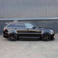 Load image into Gallery viewer, Side profile of the Range Rover Sport SVR 2018–2022 showing the full Barugzai Cabaro Wide Arch bodykit in gloss black.
