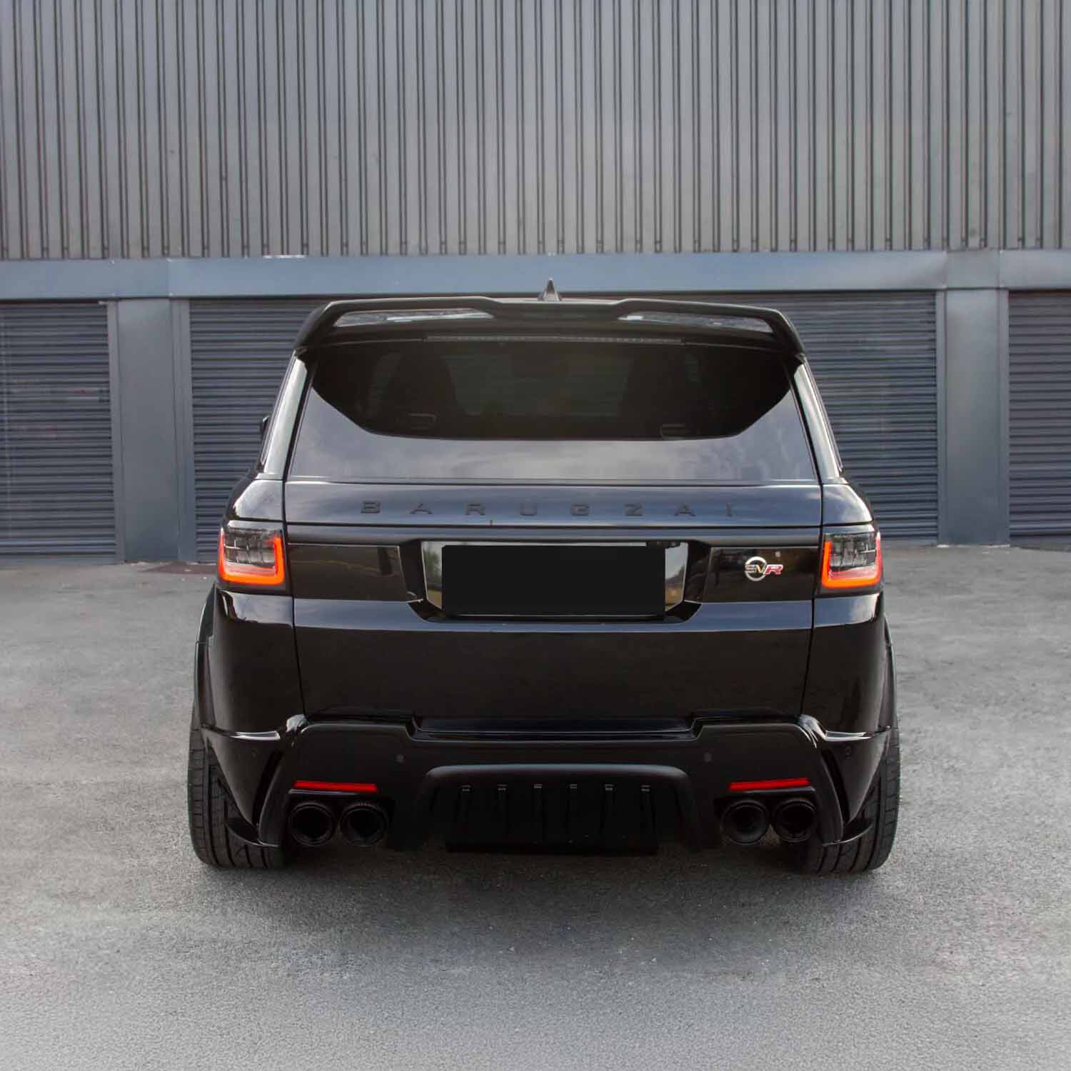 Rear view of the Range Rover Sport SVR 2018–2022, featuring the Barugzai Cabaro Wide Arch SVR bodykit and distinctive gloss black finish.