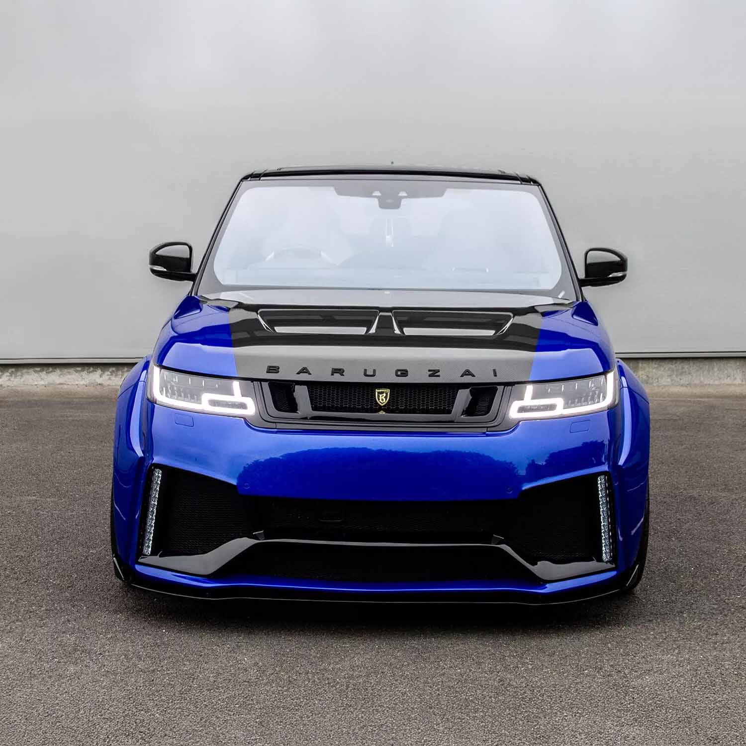 Range Rover SVR with Barugzai Cabaro bodykit captured from a direct front-facing angle, emphasizing its aggressive design.