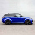 Load image into Gallery viewer, Side view of a Range Rover SVR featuring the Barugzai Cabaro bodykit, highlighting the wide arches and dynamic profile.
