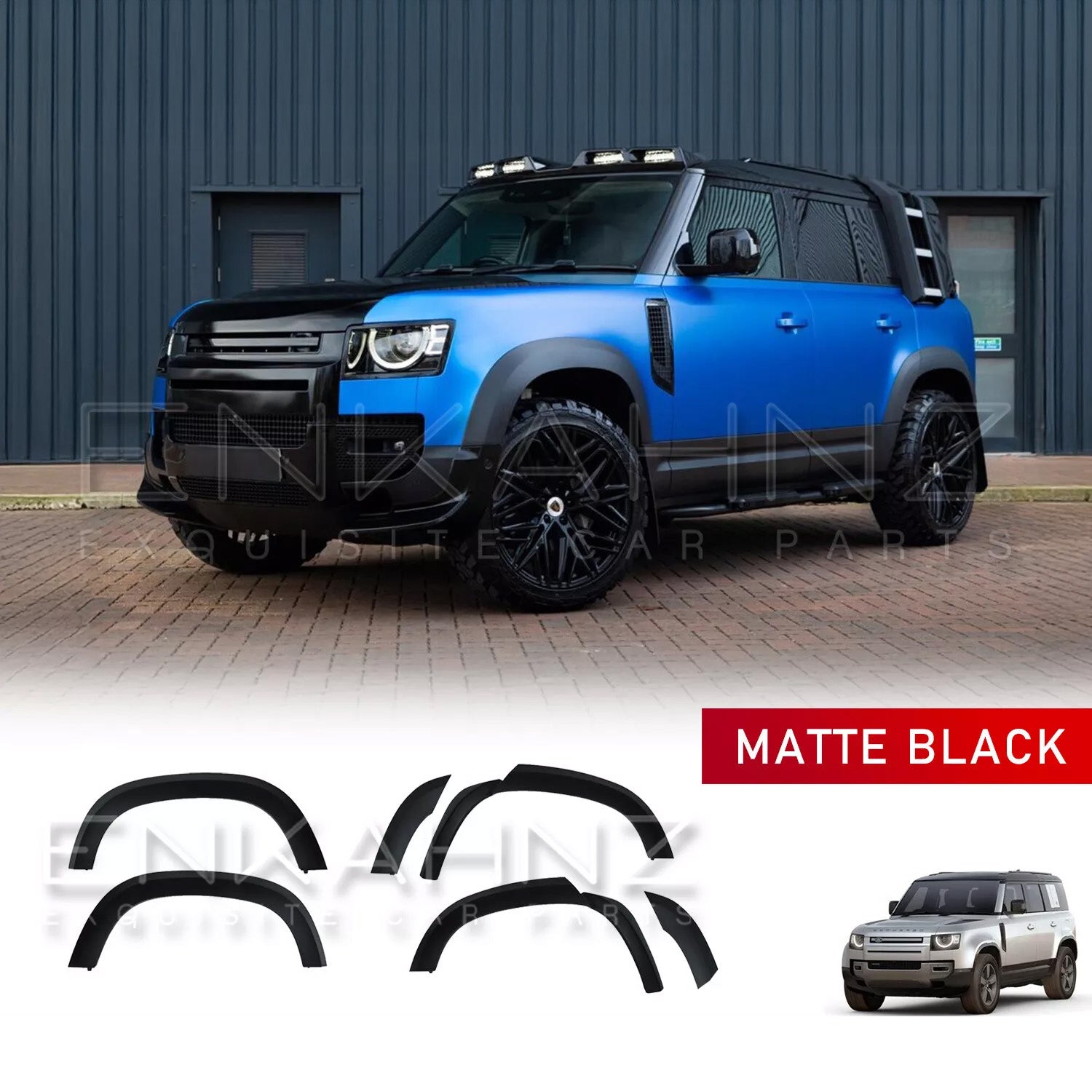 Front quarter view of a blue Defender 110 fitted with ENKAHNZ matte black wide wheel arches and Shuracan gloss black wheels, highlighting the aggressive styling and enhanced width.