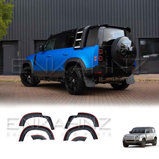 Rear quarter angle showing the blue Defender 110 with bulky ENKAHNZ matte black wheel arches and Shuracan gloss black wheels for a robust, upgraded appearance.