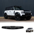 Load image into Gallery viewer, Front-left angle of a white Defender showing the LED light bar on top of the windshield.
