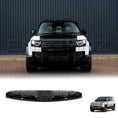 Load image into Gallery viewer, Front view of a white Defender fitted with a 4 LED front light bar mounted above the windshield.
