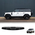 Load image into Gallery viewer, Side view from the right of a white Defender, focusing on the four-LED light bar above the windshield.
