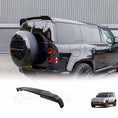 Load image into Gallery viewer, ENKAHNZ Rear roof spoiler fitted on Defender 90/110 that enhances the look of the rear end of the car and gives a sporty aerodynamic look with the rear roof spoiler product at the bottom.


