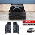 Load image into Gallery viewer, Defender rear side showcasing black smoked edition rear lights
