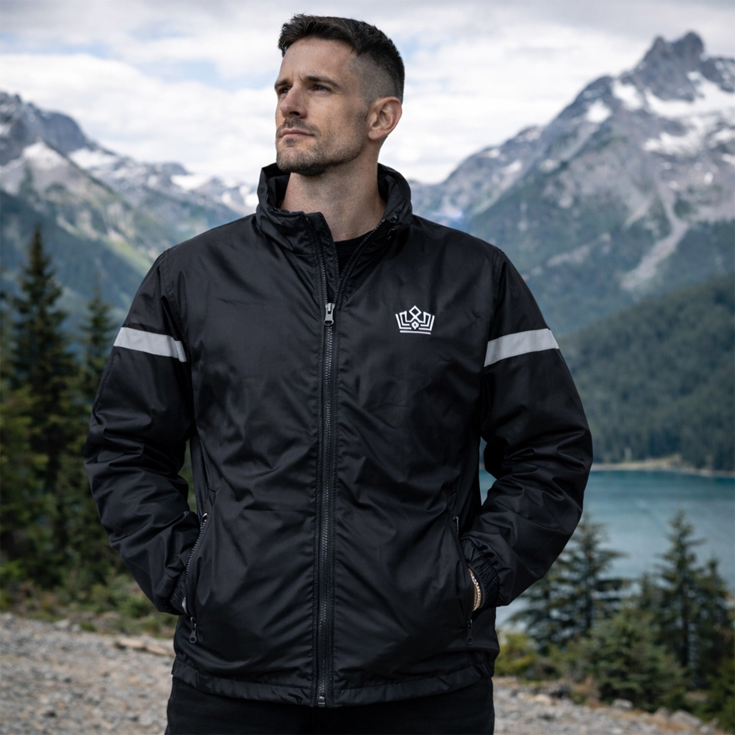 Enkahnz Trademark Crown Jacket – Black in a nature background front view.