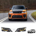 Load image into Gallery viewer, Orange and black Range Rover Sport in motion on the road, featuring ENKAHNZ facelift headlights installed, highlighting the modern, aggressive front lighting design.
