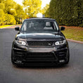 Load image into Gallery viewer, Front-facing view of Range Rover Sport showcasing the ENKAHNZ LM Style bodykit, with a focus on the upgraded LM style front bumper for enhanced, aggressive styling.
