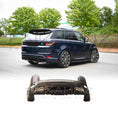 Load image into Gallery viewer, Rear quarter angle of a navy blue Range Rover Sport 2018–2022 featuring the Enkahnz LM style rear bumper, with the product image displayed at the bottom.
