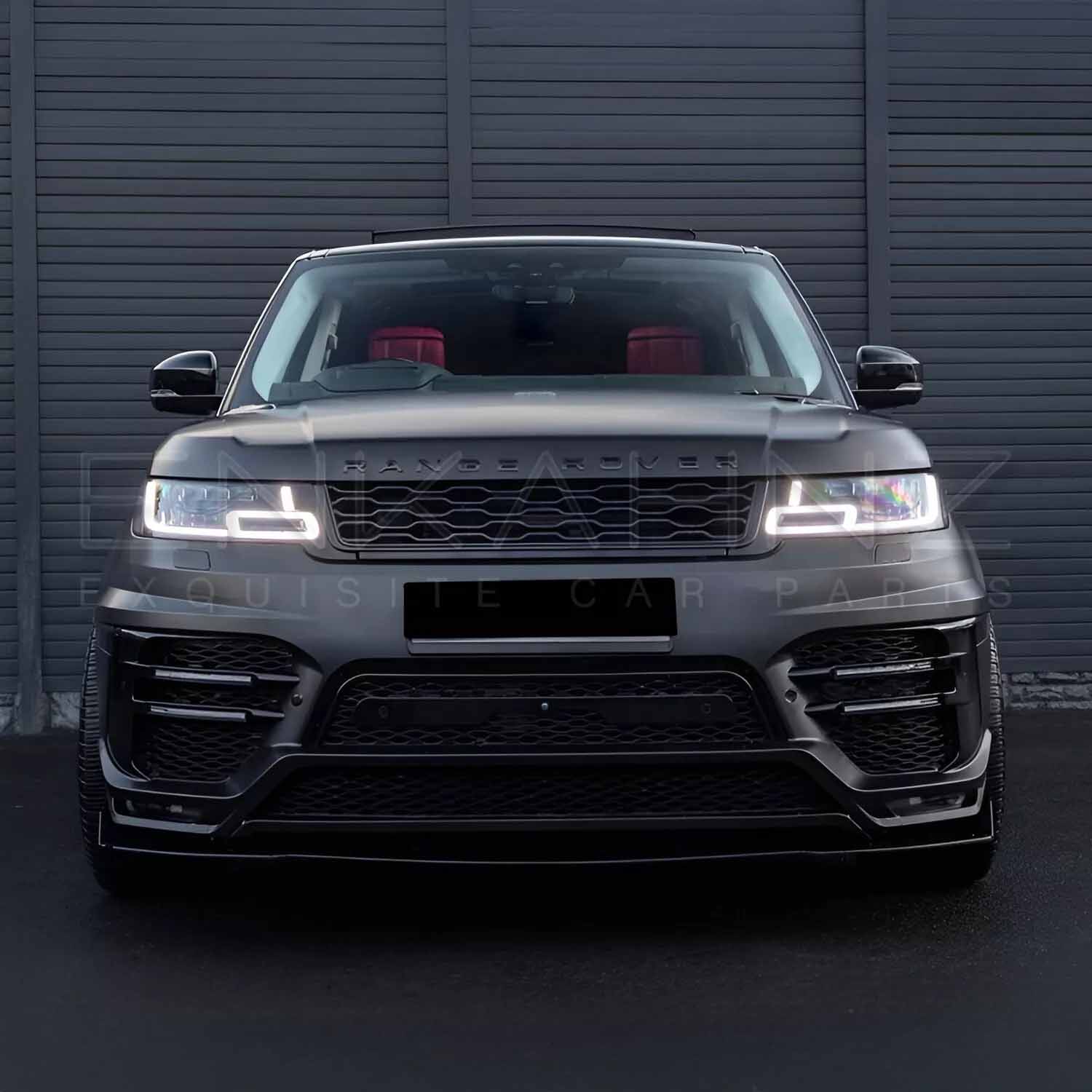 Low front angle of Range Rover Sport 2018–2022 fitted with Enkahnz LM style bodykit, highlighting the aggressive front bumper and styling features.
