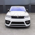 Load image into Gallery viewer, Close-up of a white Barugzai badge on a Range Rover Sport 2018–2022, with the Enkahnz LM style bodykit visible on a front-facing angle.
