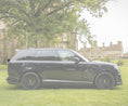 Load image into Gallery viewer, A black gloss black mid boot spoiler of the range rover vogue L460 2022+ with the rest of the car and the background in an opaque white.
