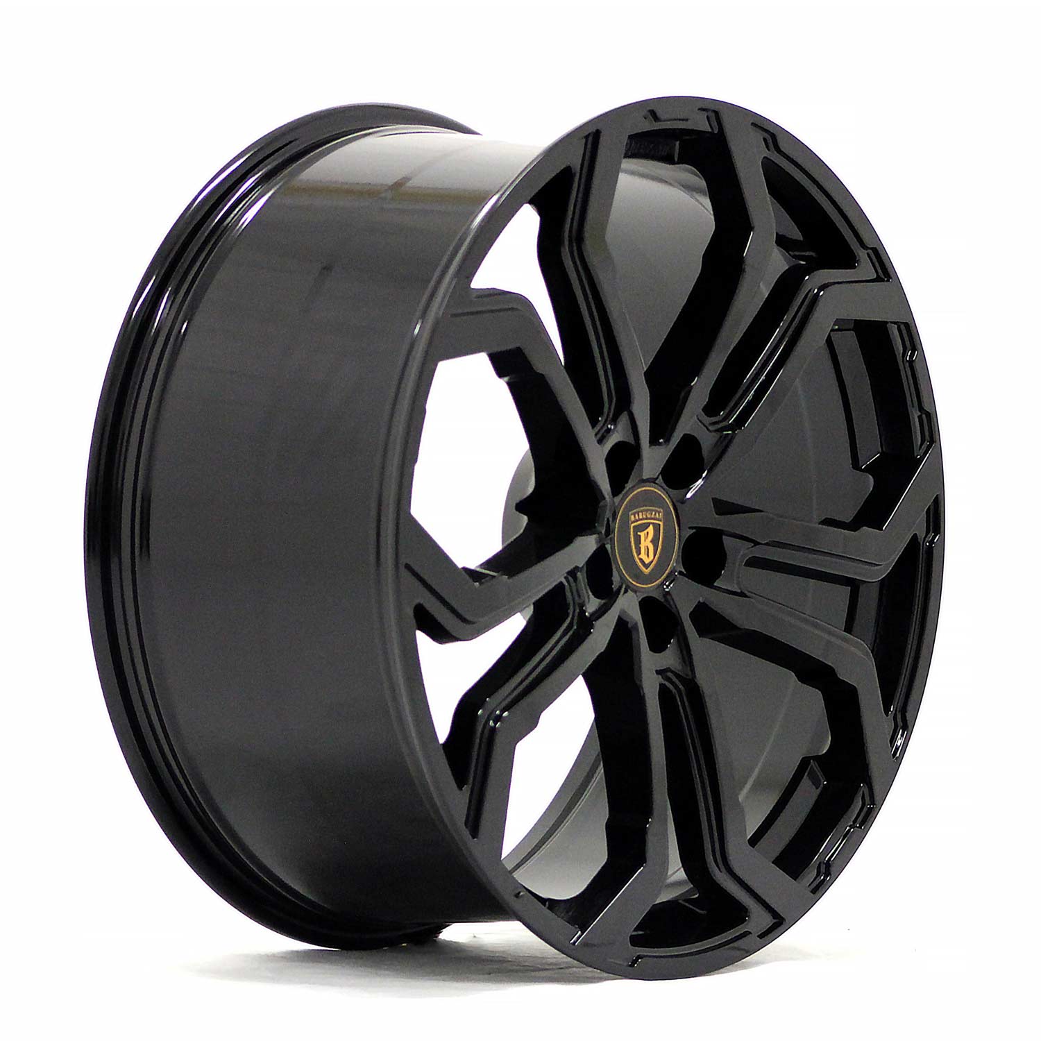Angle shot of Barugzai Opium 22" finished in Gloss Black, on a white background 