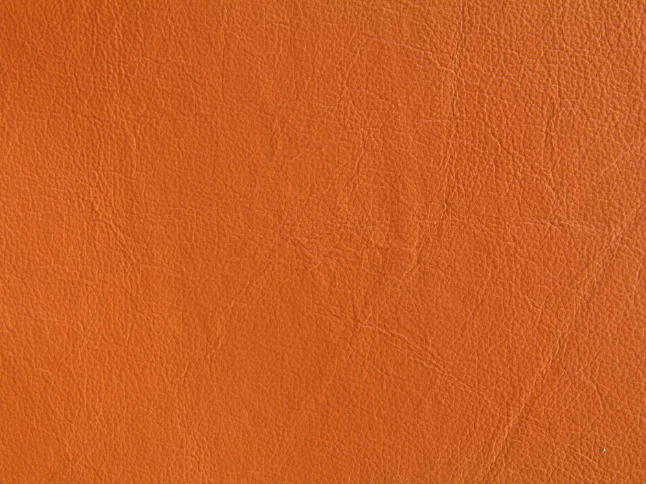 Close-up of orange leather texture