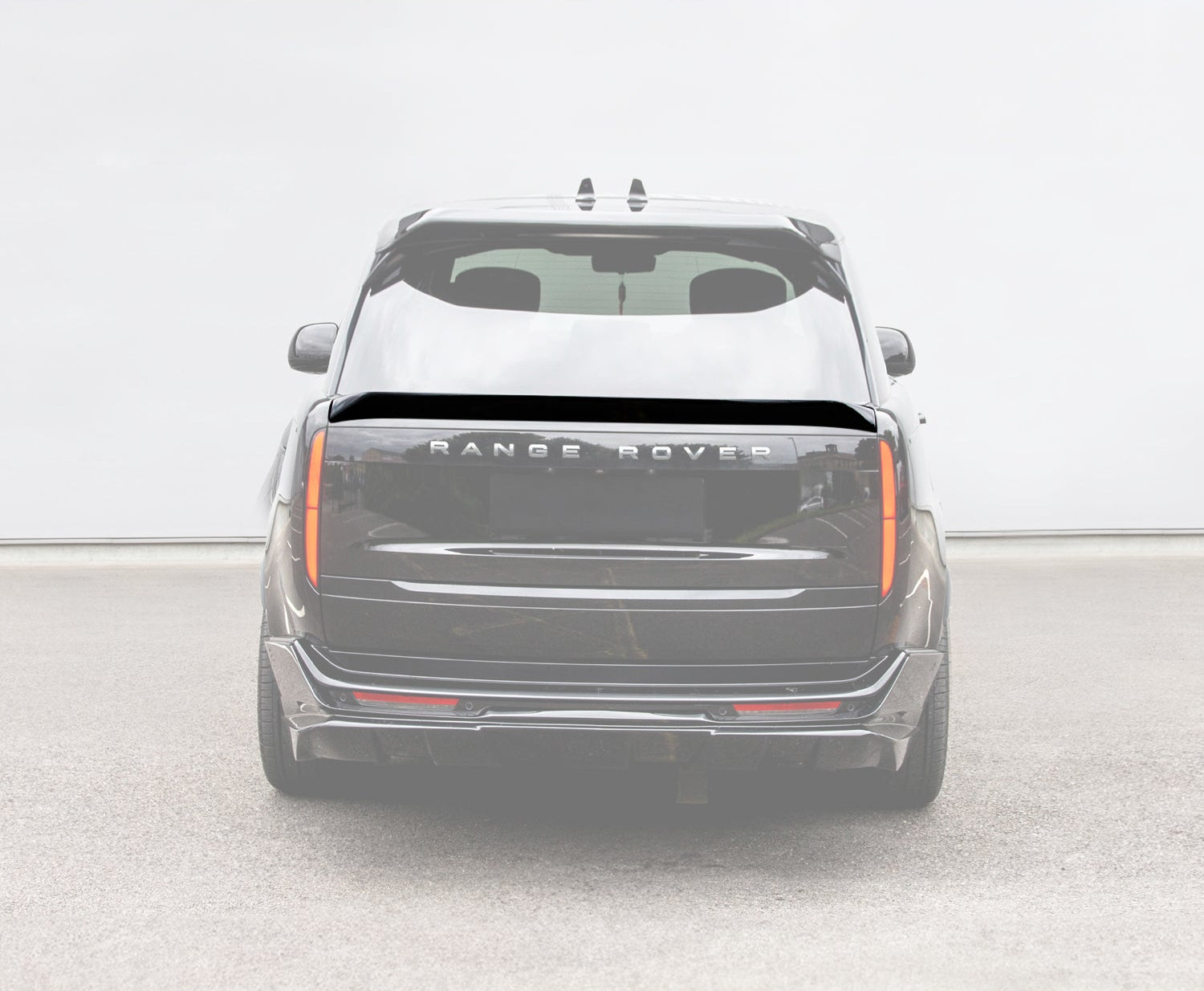Rear view of a Range Rover Vogue 2022+ L460 vehicle Mid Boot Spoiler on a white opaque background of the entire car.
