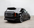 Load image into Gallery viewer, Rear Quarter View of a Black Range Range Rover Vogue 2022+ on a grey background with a Barugzai Roof Spoiler.
