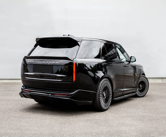 Rear Quarter View of a Black Range Range Rover Vogue 2022+ on a grey background with a Barugzai Mid Boot Spoiler. 