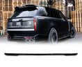 Load image into Gallery viewer, Rear Quarter Close up of a gloss black range rover vogue L460 2022+ in a warehouse background with the mid boot spoiler placed in the bottom in front of a white background with Barugzai Branding.

