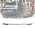 Load image into Gallery viewer, Rear Quarter Close up of a gloss black range rover vogue L460 2022+ mid boot spoiler in an opaque white warehouse background with the roof spoiler placed in the bottom in front of a white background with Barugzai Branding.
