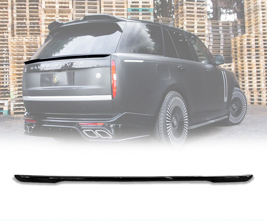 Rear Quarter Close up of a gloss black range rover vogue L460 2022+ roof spoiler in an opaque white warehouse background with the mid boot spoiler placed in the bottom in front of a white background with Barugzai Branding.