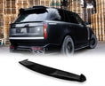 Load image into Gallery viewer, Rear Quarter Close up of a gloss black range rover vogue L460 2022+ in a warehouse background with the roof spoiler placed in the bottom in front of a white background with Barugzai Branding.

