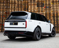 Load image into Gallery viewer, White Range Rover Vogue 2022+ L460 in a warehouse with Barugzai Branding.
