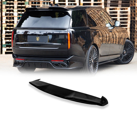 Close up of a gloss black range rover vogue L460 2022+ in a warehouse background with the roof spoiler placed in the bottom in front of a white background with Barugzai Branding.