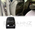 Load image into Gallery viewer, Rear Quarter view of the Rear Seat in a G-Wagon W464-W465 with the item in the bottom. 
